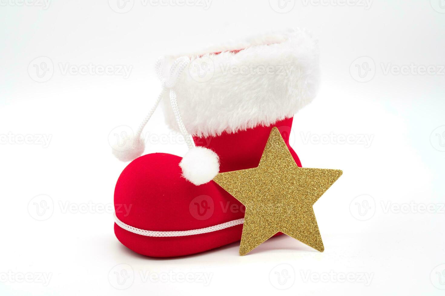 Santa's shoe and Gold Star isolated on white background. Christmas background. photo