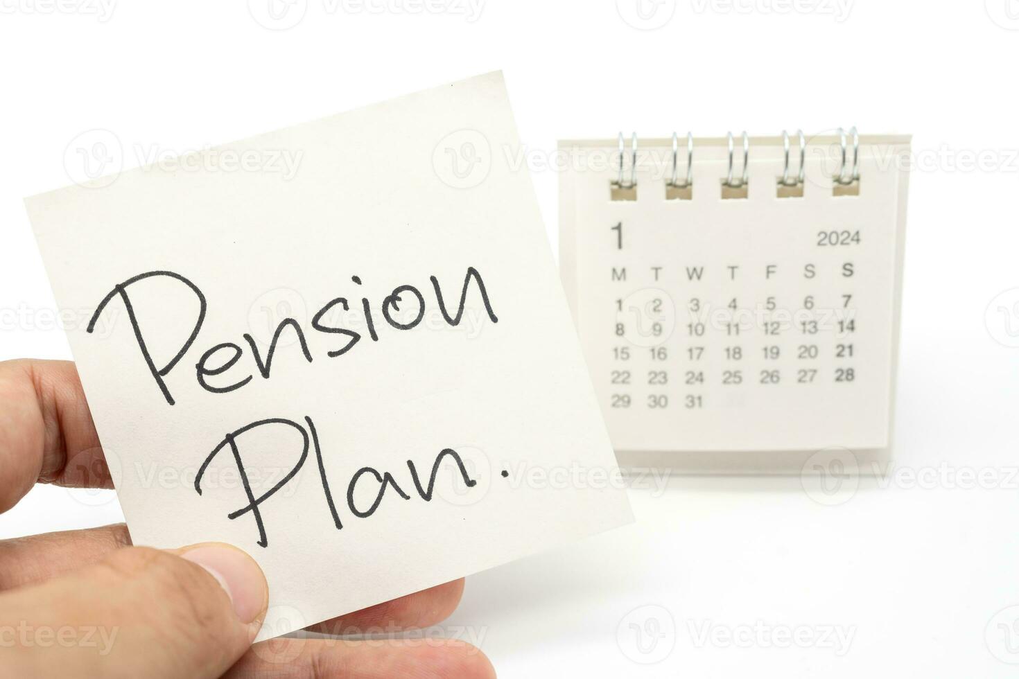 Start Jan 2024 desk calendar. Goals, Pension Plan, Money Saving, Retirement fund, Pension, Investment and Financial concept. Concept for retirement or savings. photo