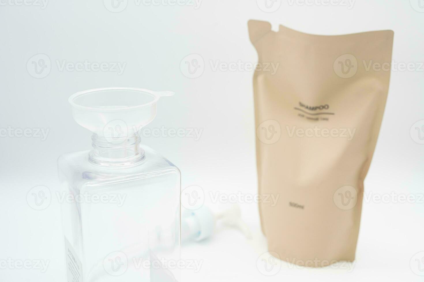 Plastic packaging for refill pouch and Plastic pump bottle in isolated background. Zero waste. Reuse reduce recycle concept. Refillable reusable personalised pump dispenser bottles. photo