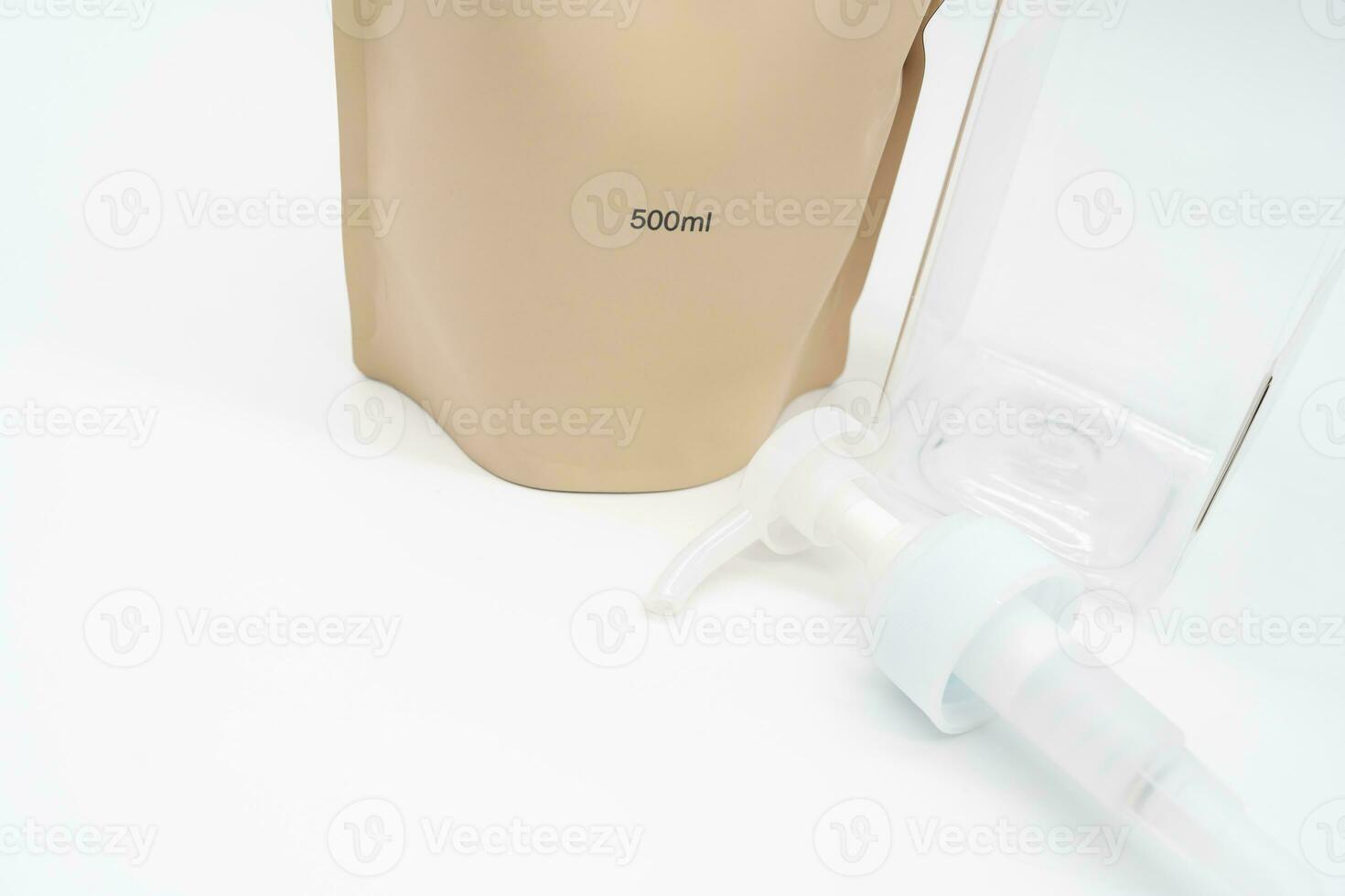 Plastic packaging for refill pouch and Plastic pump bottle in isolated background. Zero waste. Reuse reduce recycle concept. Refillable reusable personalised pump dispenser bottles. photo