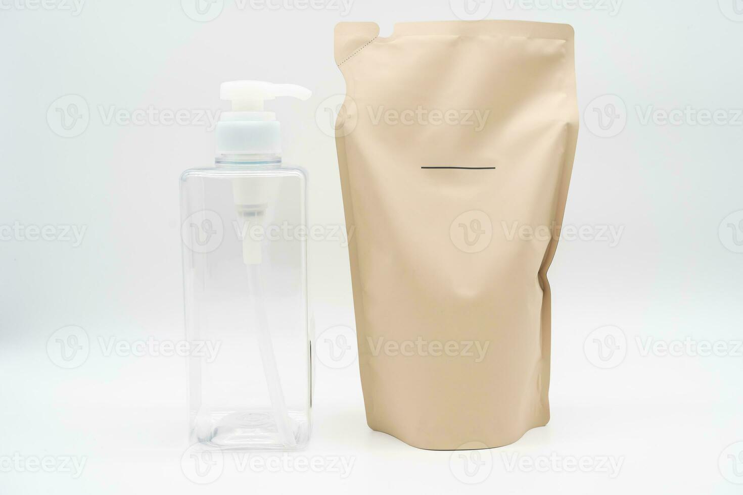 Plastic packaging for refill pouch and Plastic pump bottle in isolated background. Zero waste. Reuse reduce recycle concept. Refillable reusable personalised pump dispenser bottles. photo