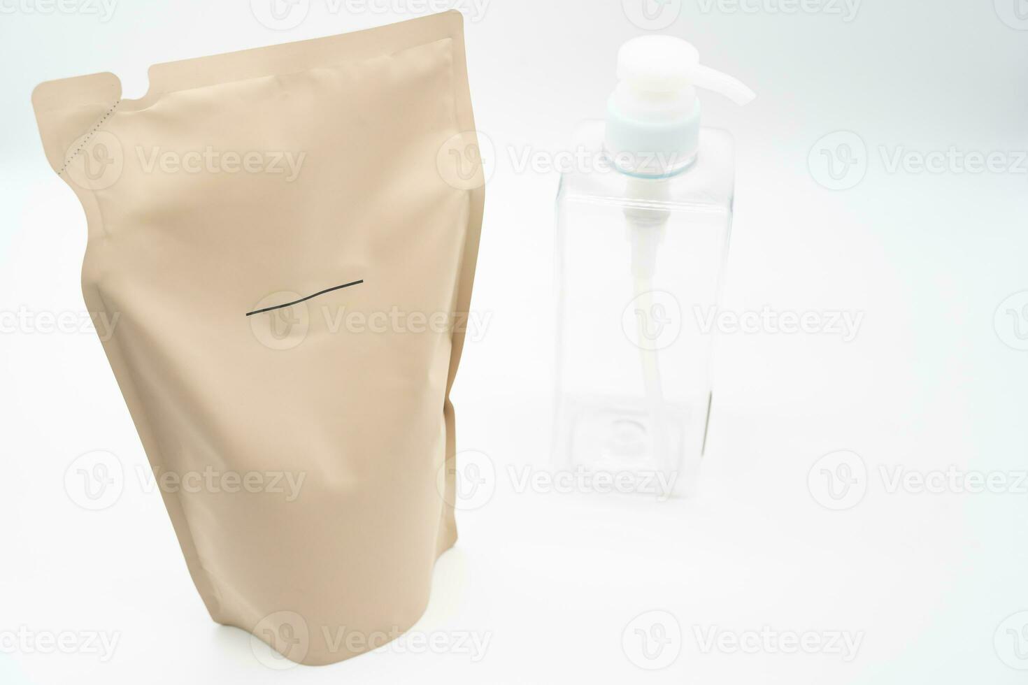 Plastic packaging for refill pouch and Plastic pump bottle in isolated background. Zero waste. Reuse reduce recycle concept. Refillable reusable personalised pump dispenser bottles. photo