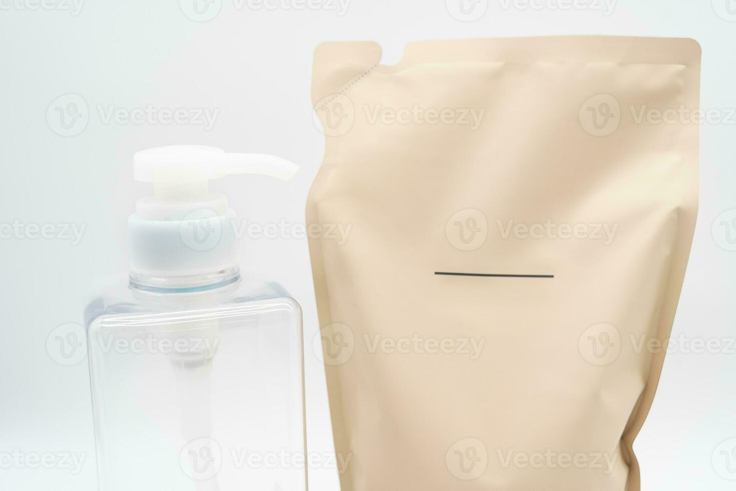 Plastic packaging for refill pouch and Plastic pump bottle in isolated background. Zero waste. Reuse reduce recycle concept. Refillable reusable personalised pump dispenser bottles. photo