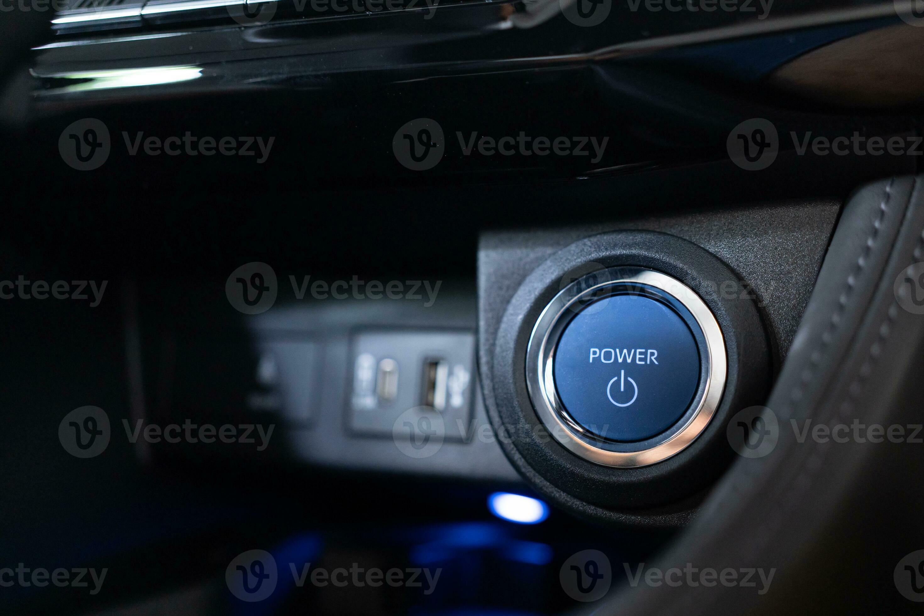 Blue power ignition button to start keyless ignition hybrid car engine