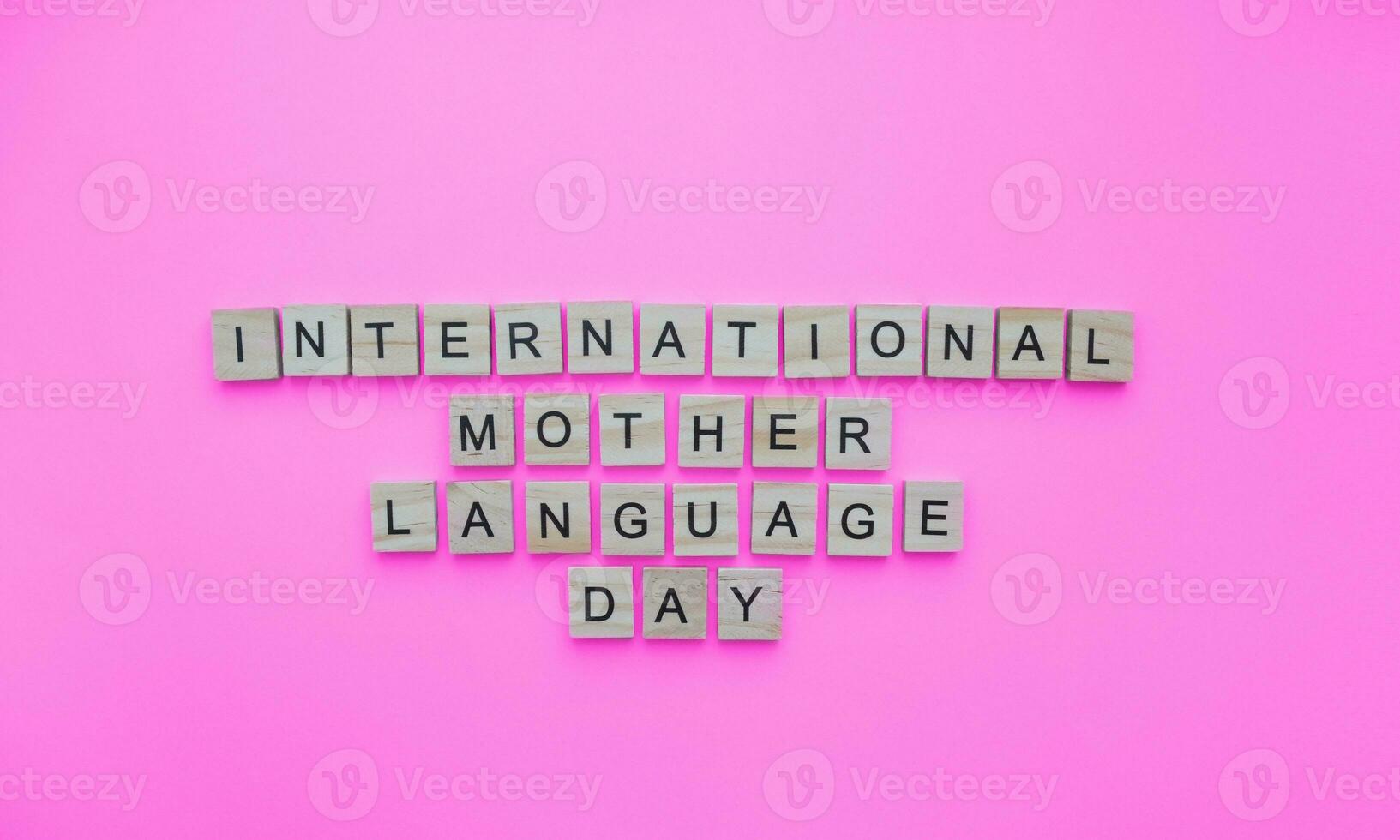 February 21, International Mother Language Day, minimalistic banner with the inscription in wooden letters photo