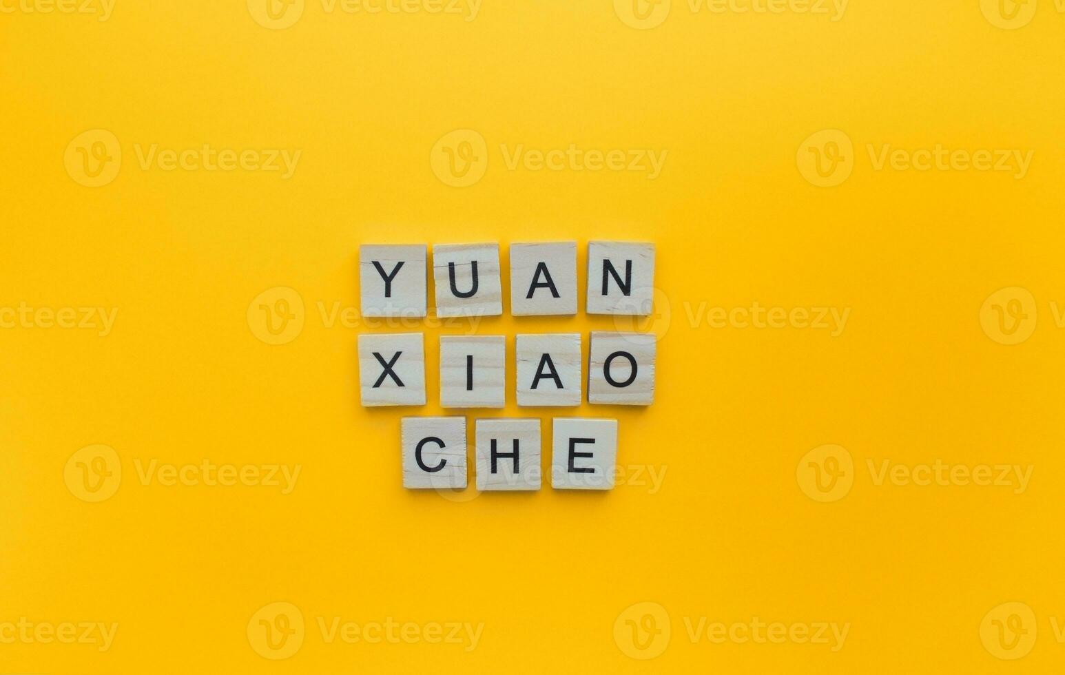 February 5, Chinese Lantern Festival, Yuan-Xiao Che, minimalistic banner with wooden letters photo