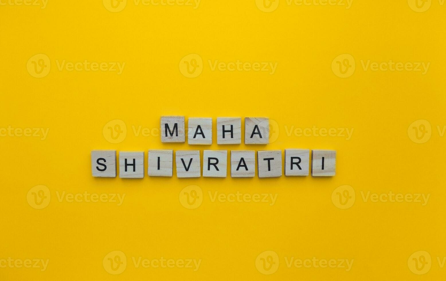 February 18, Maha Shivaratri, a minimalistic banner with an inscription in wooden letters photo