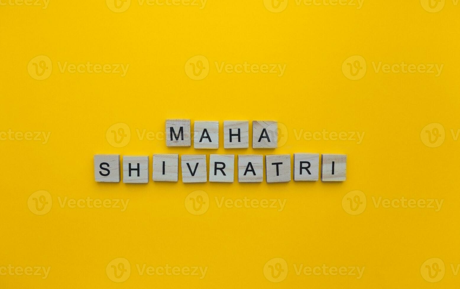 February 18, Maha Shivaratri, a minimalistic banner with an inscription in wooden letters photo