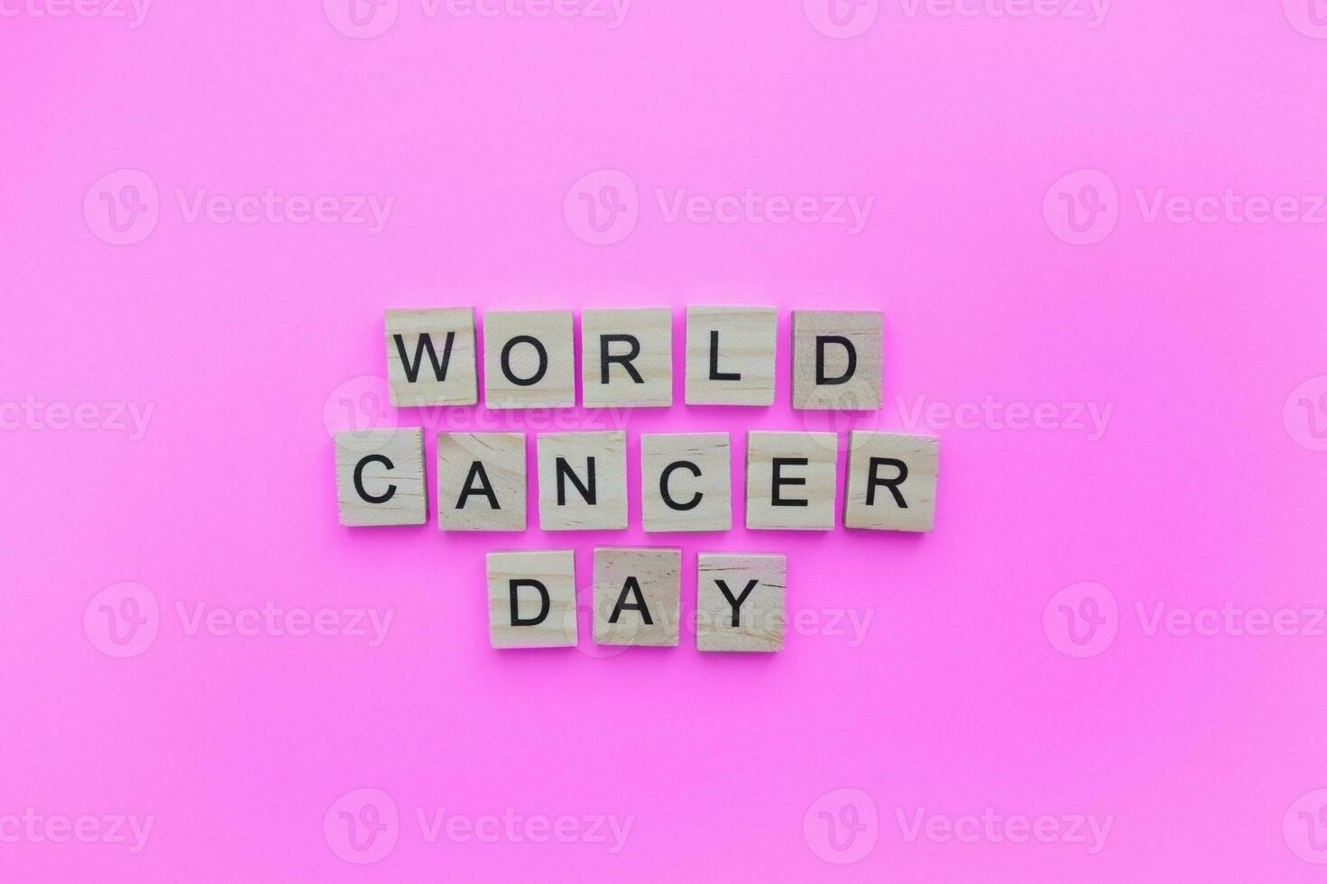 February 4, World Cancer Day, minimalistic banner with the inscription in wooden letters photo