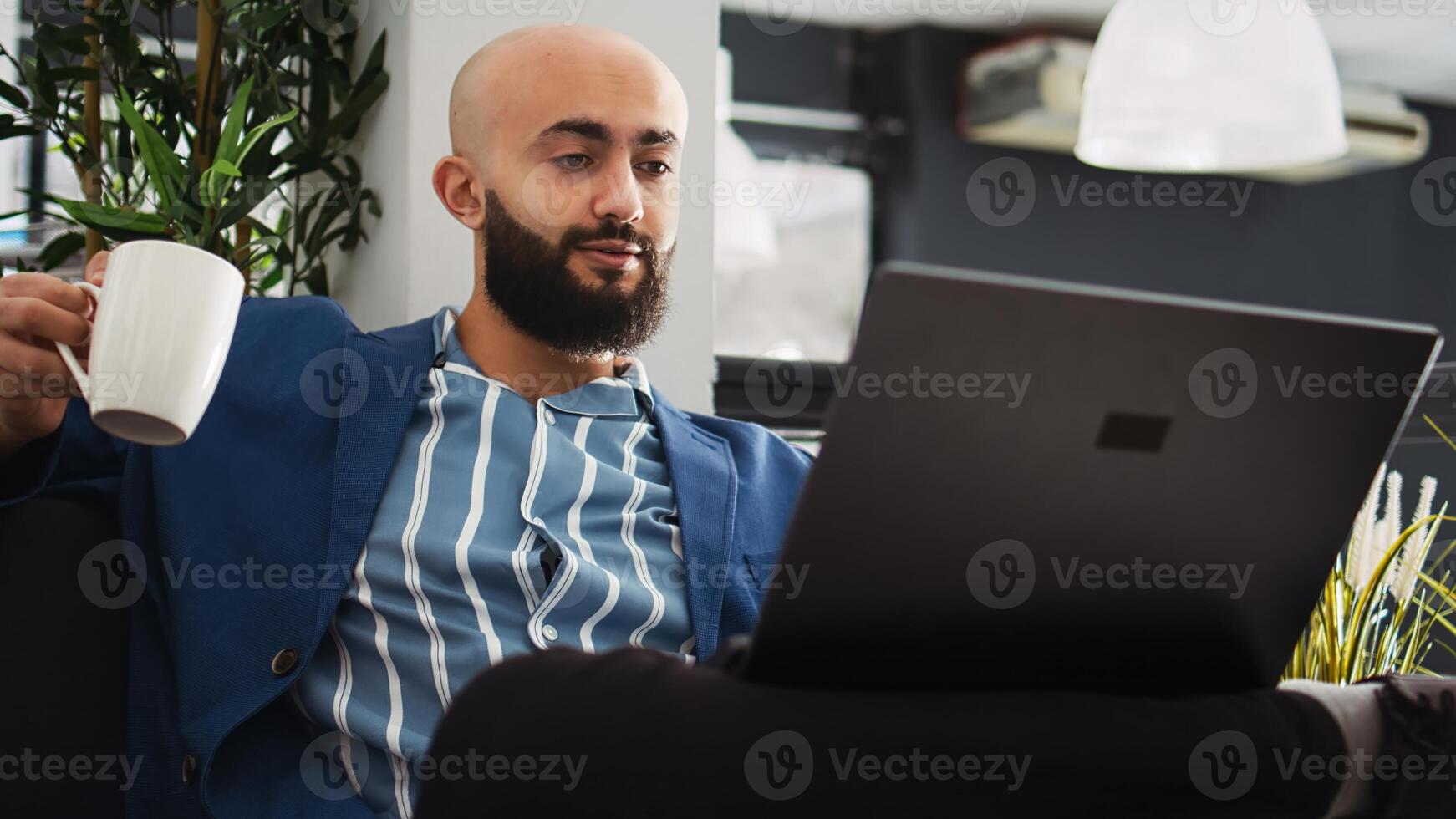 Business professional review analytics, looking at past online reports on laptop. Focused company worker solving strategy problems to prepare startup management for development. photo