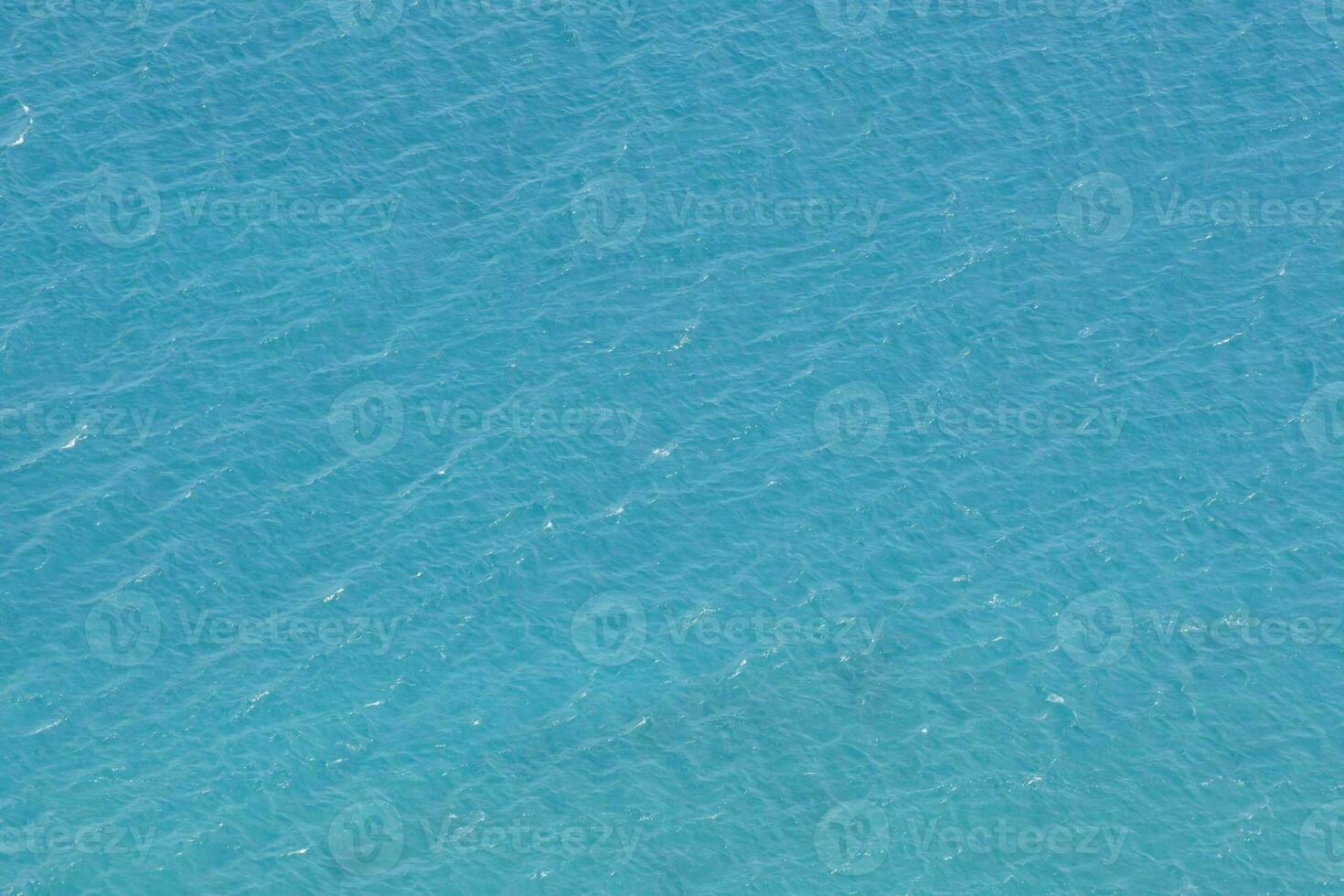 an aerial view of a body of water photo