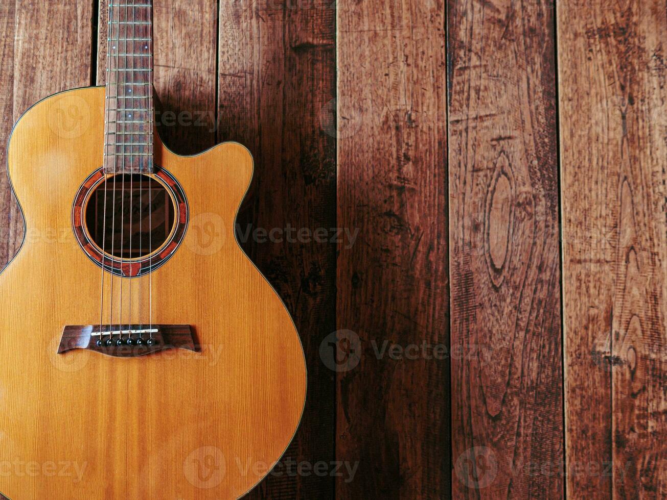 classical guitar on wooden background photo