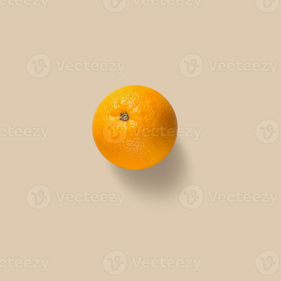 Orange fruit on wooden table background photo