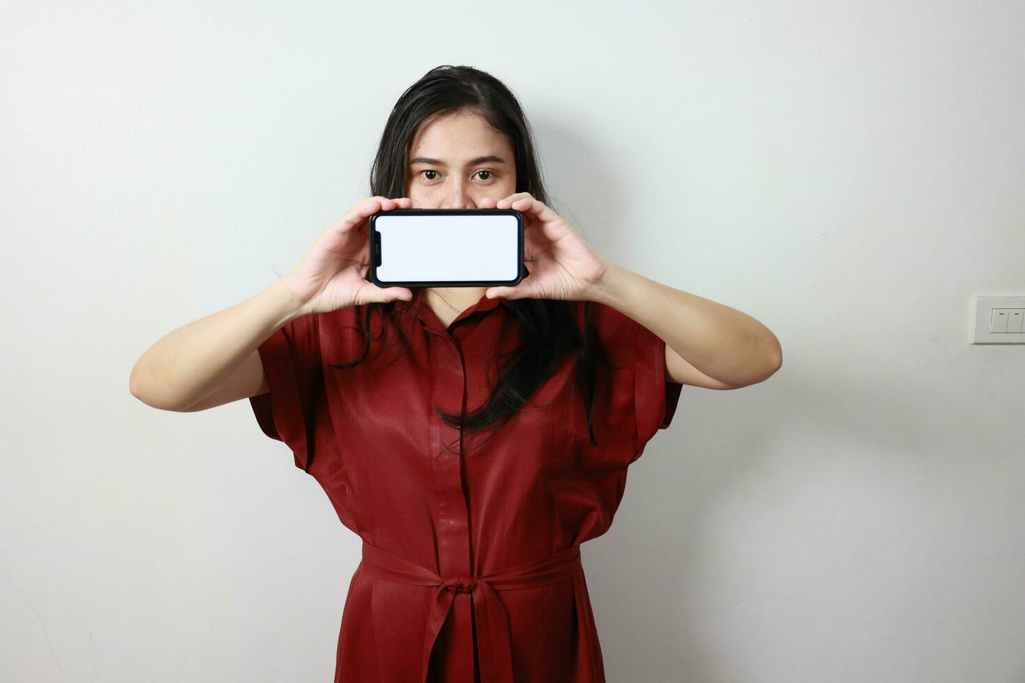 Woman holding smartphone, technology business concept photo