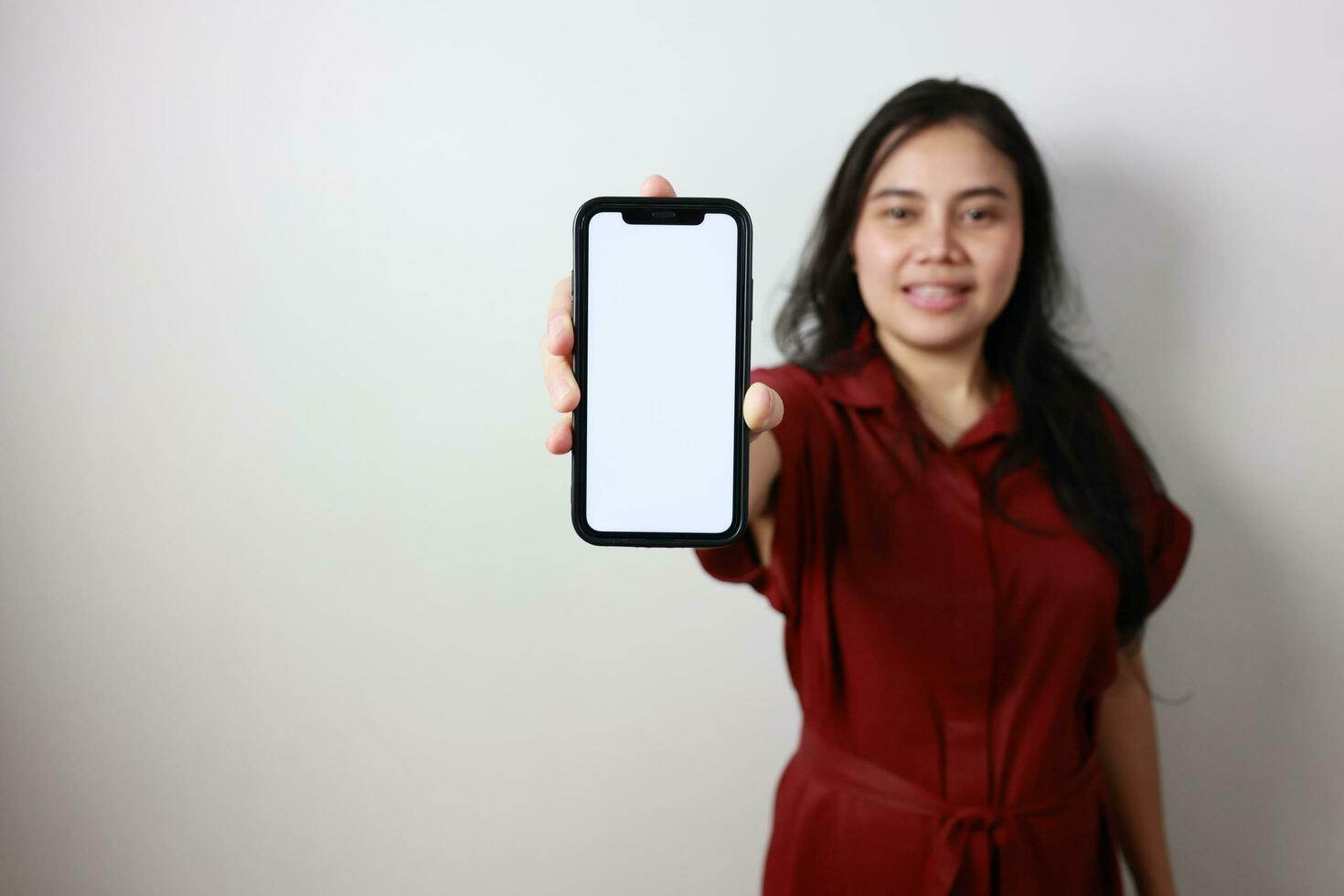 Woman holding smartphone, technology business concept photo