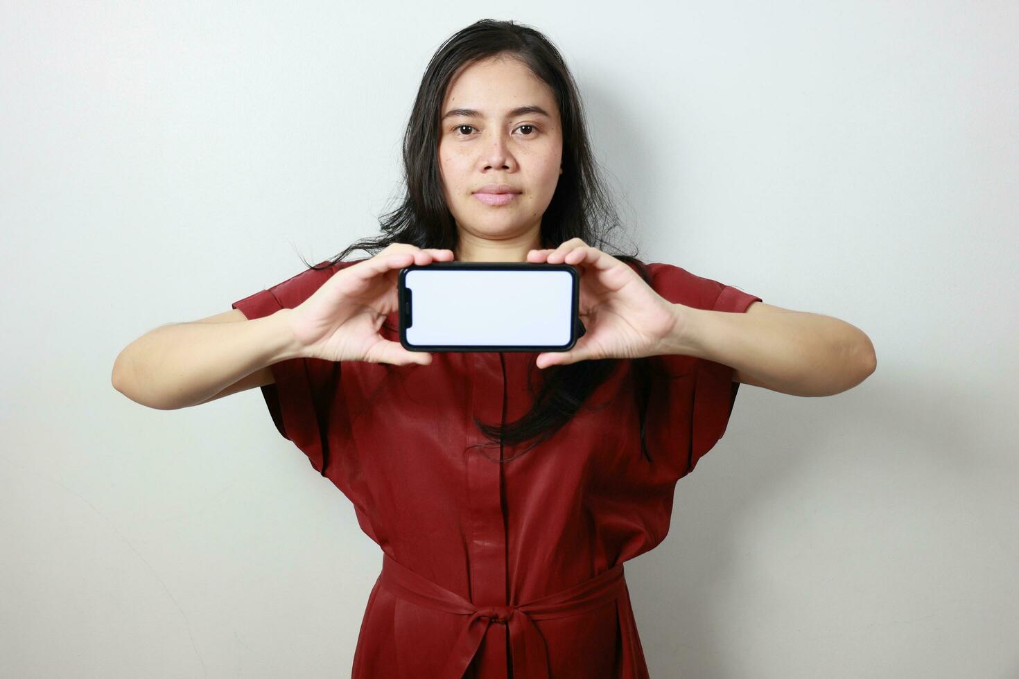 Person of a woman holding phone photo