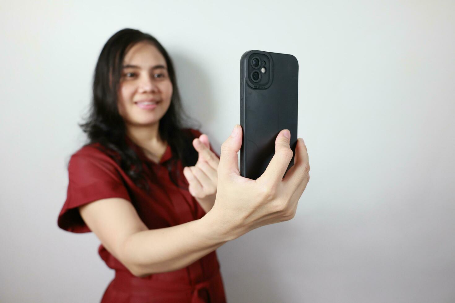 Person of a woman holding phone photo
