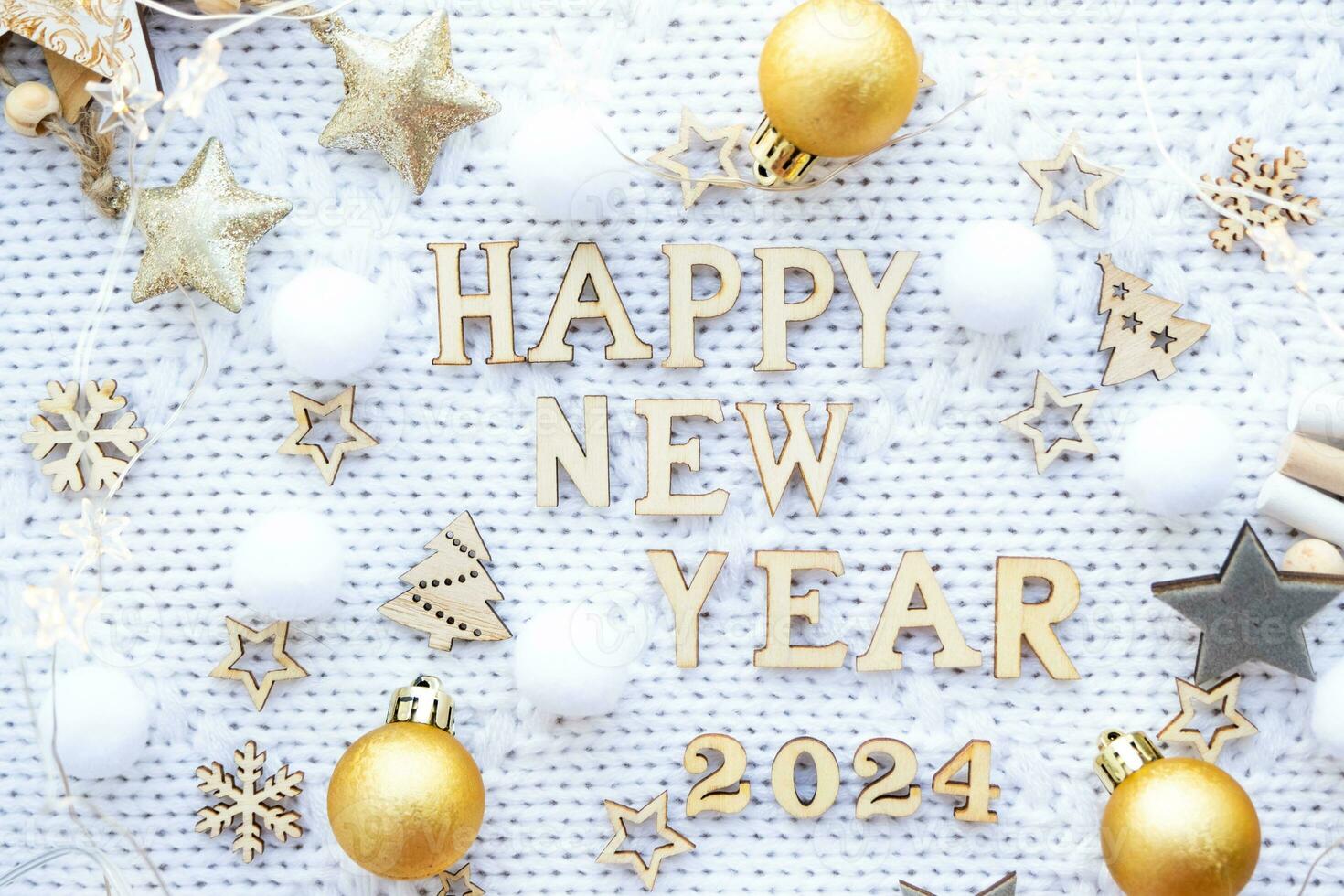 Happy New Year wooden letters and the numbers 2024 on cozy festive white knitted background with sequins, stars, lights of garlands. Greetings, postcard. Calendar, cover photo