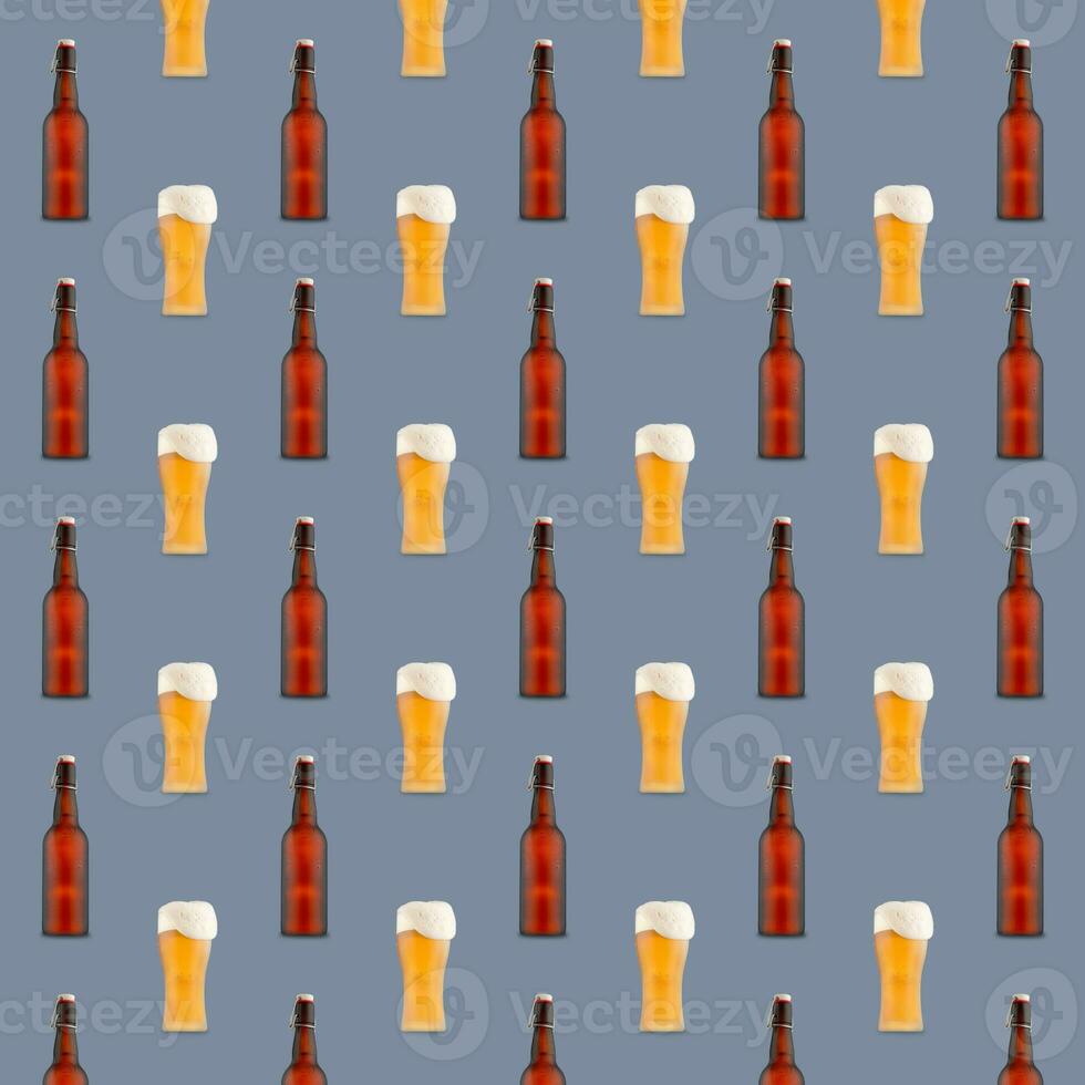 Seamless pattern of large beer glass full of beer with foam and bottles on gray background. photo