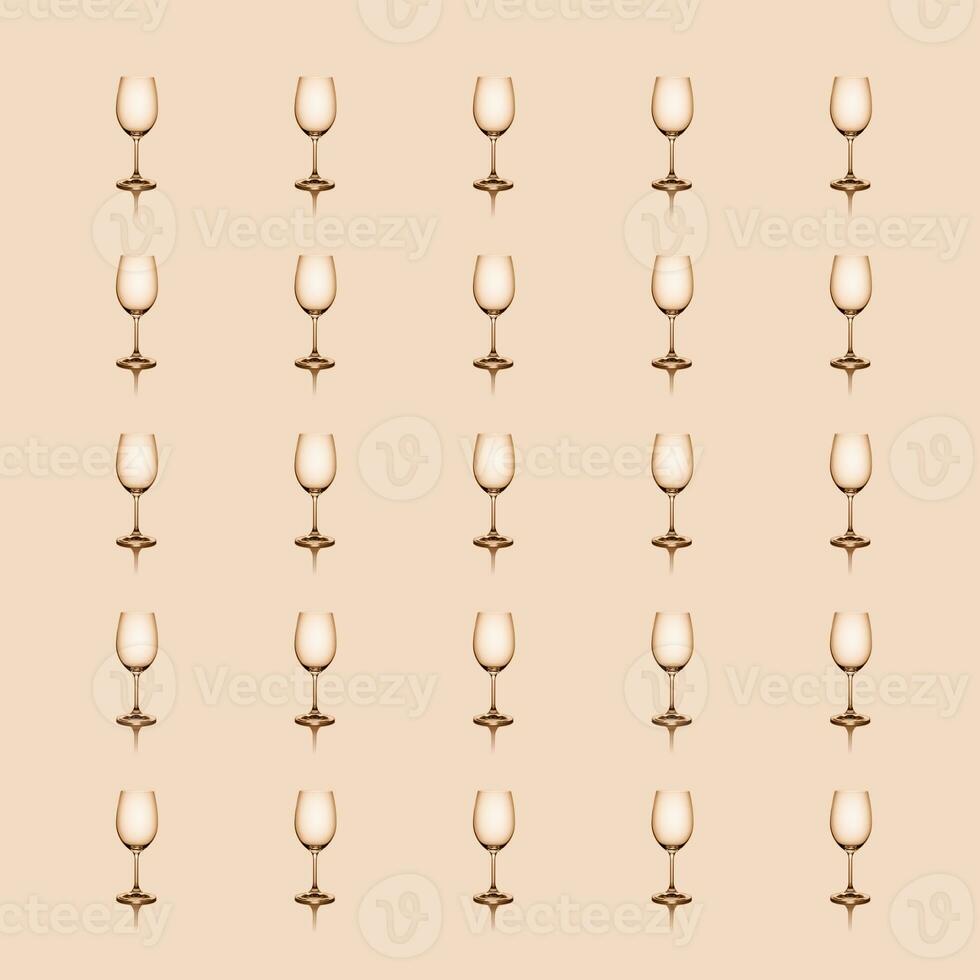 Seamless pattern of empty wine glasses on beige background. photo