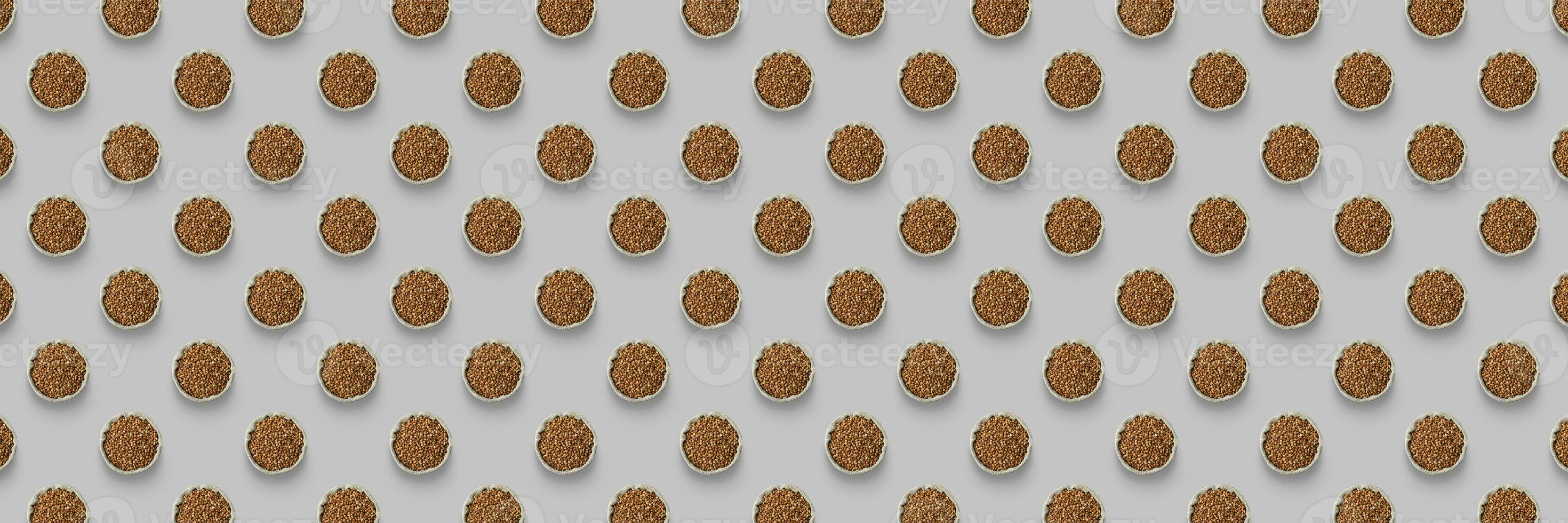 Pattern buckwheat bags are isolated on a gray background. Top view photo