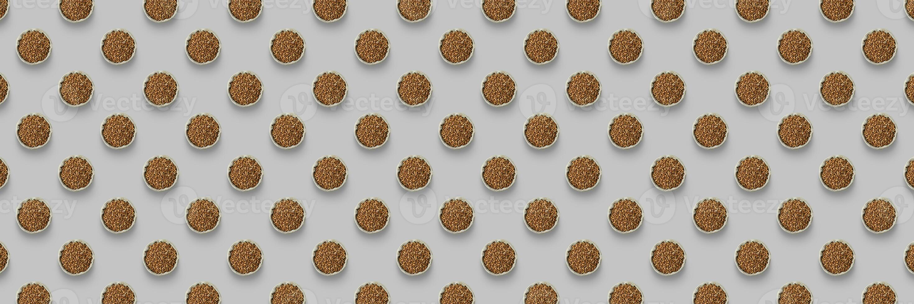 Pattern buckwheat bags are isolated on a gray background. Top view photo