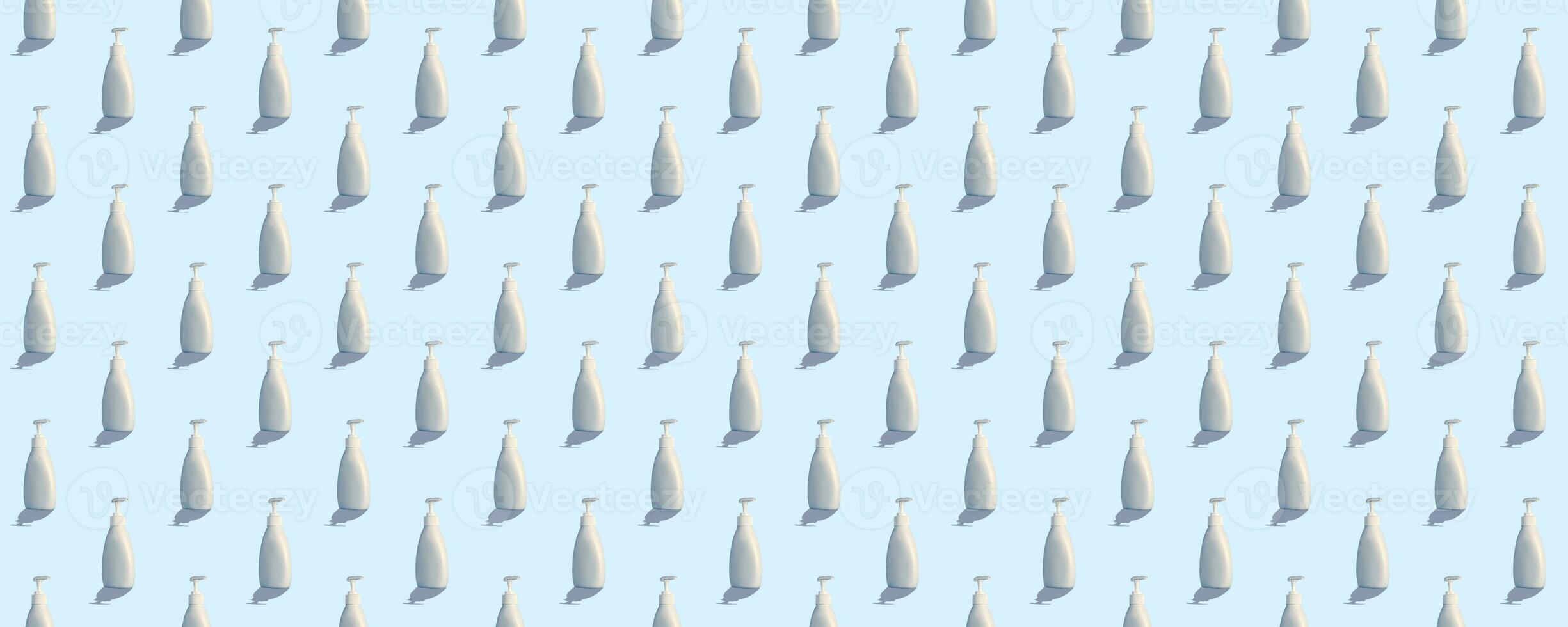 Trendy pattern with antiseptic. White bottle of instant antiseptic hand sanitizer on blue background, no label. photo