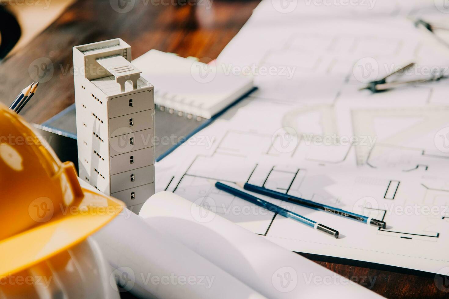 Construction and structure concept of engineer working drawing on blueprint meeting for project working with partner on model building and engineering tools in working site, construction concept. photo