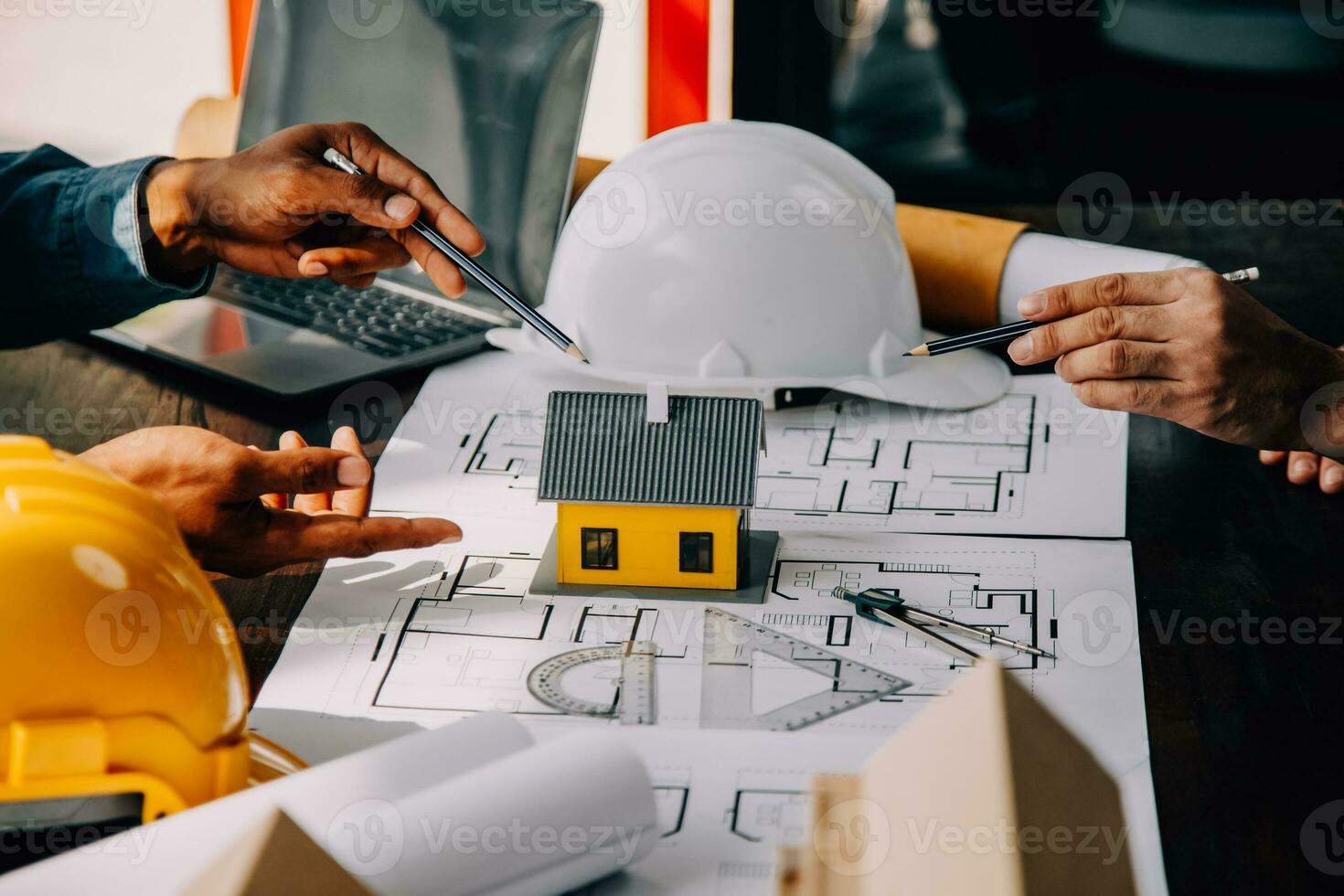 Construction and structure concept of engineer working drawing on blueprint meeting for project working with partner on model building and engineering tools in working site, construction concept. photo