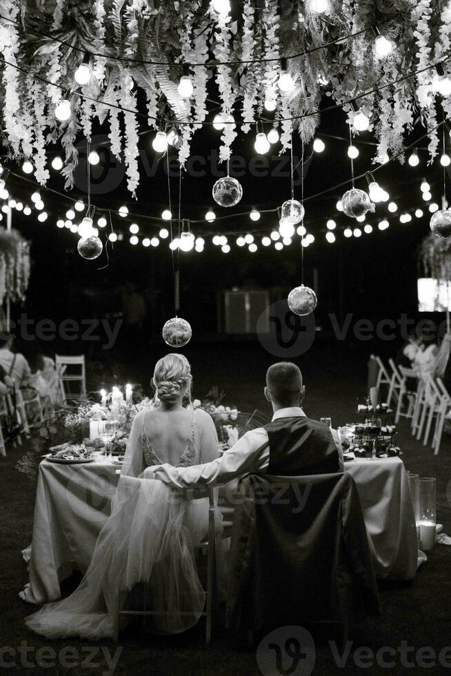 evening wedding family dinner in the forest photo