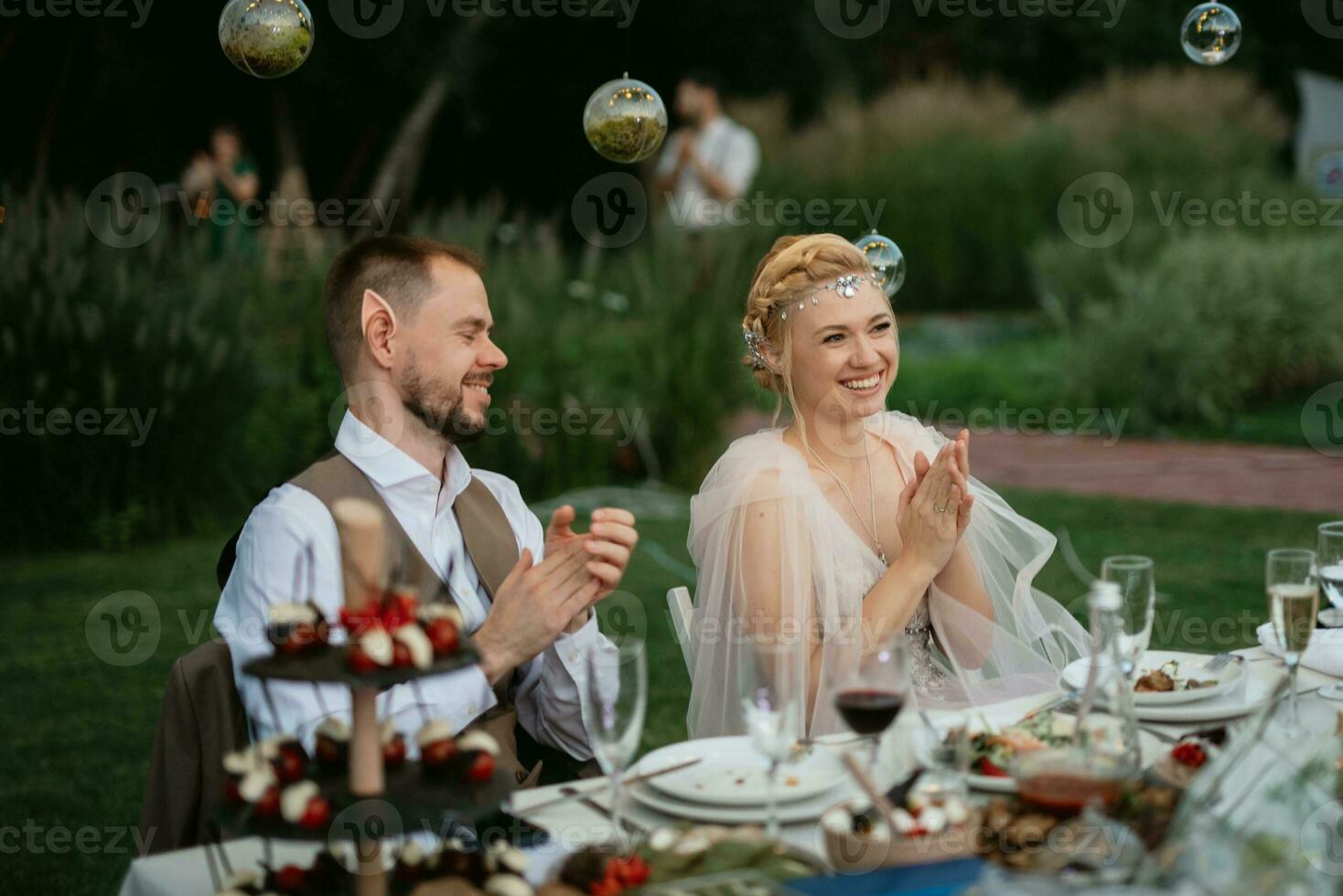 evening wedding family dinner in the forest photo