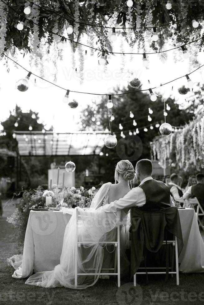 evening wedding family dinner in the forest photo