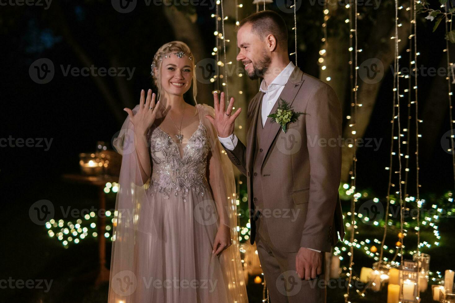 night wedding ceremony of the newlyweds in a country cottage photo