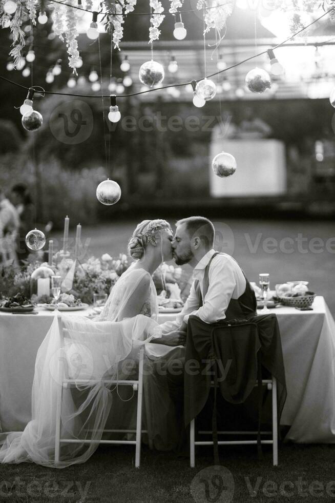 evening wedding family dinner in the forest photo