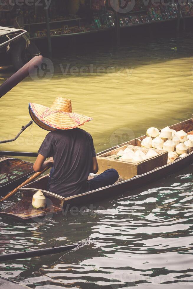 Traditional floating market in Damnoen Saduak near Bangkok photo