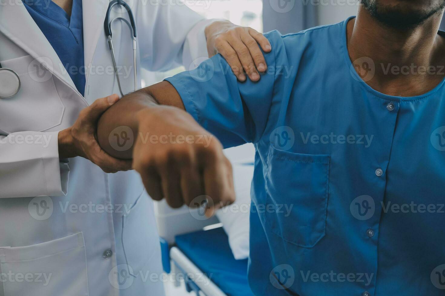 Doctor and patient discussing current health examination while sitting at the desk in clinic office, closeup. Medicine concept. photo