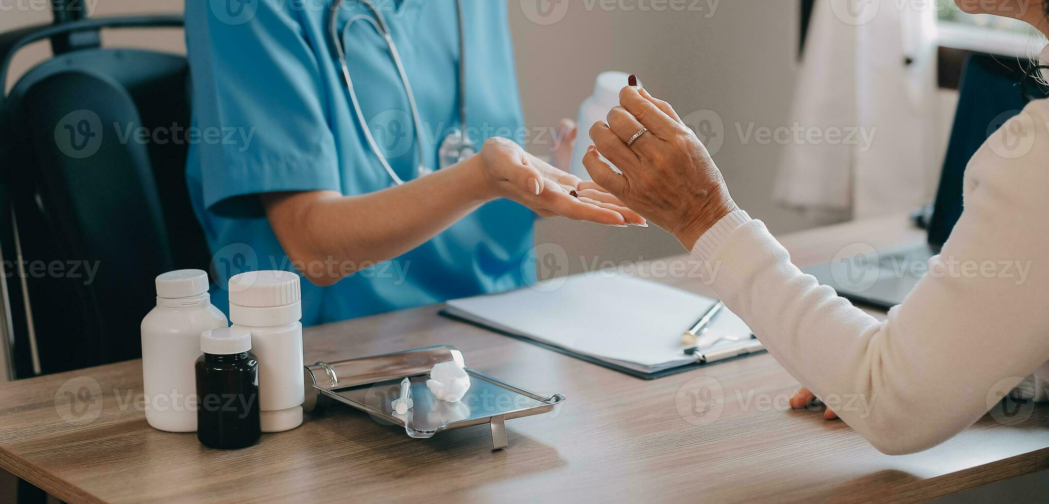 Asian doctor woman visited patient woman to diagnosis and check up health at home or private hospital. Female patient explain health problem and symptoms to doctor .Health care premium service at home photo