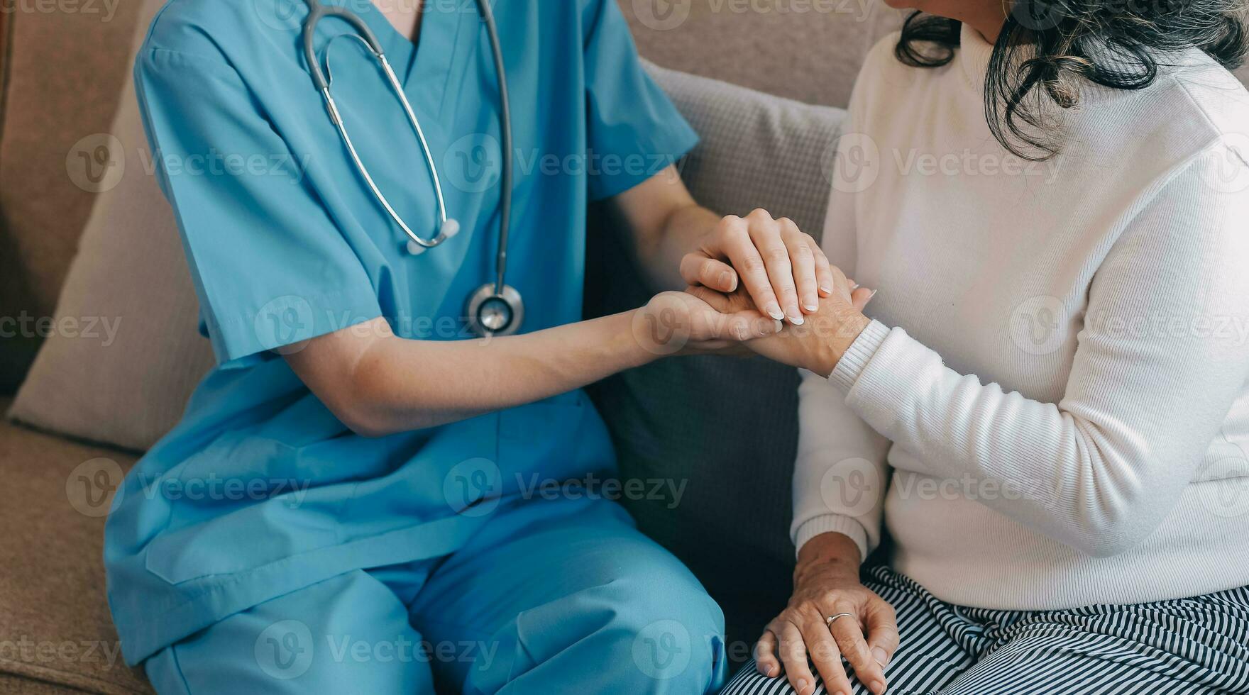 Asian doctor woman visited patient woman to diagnosis and check up health at home or private hospital. Female patient explain health problem and symptoms to doctor .Health care premium service at home photo
