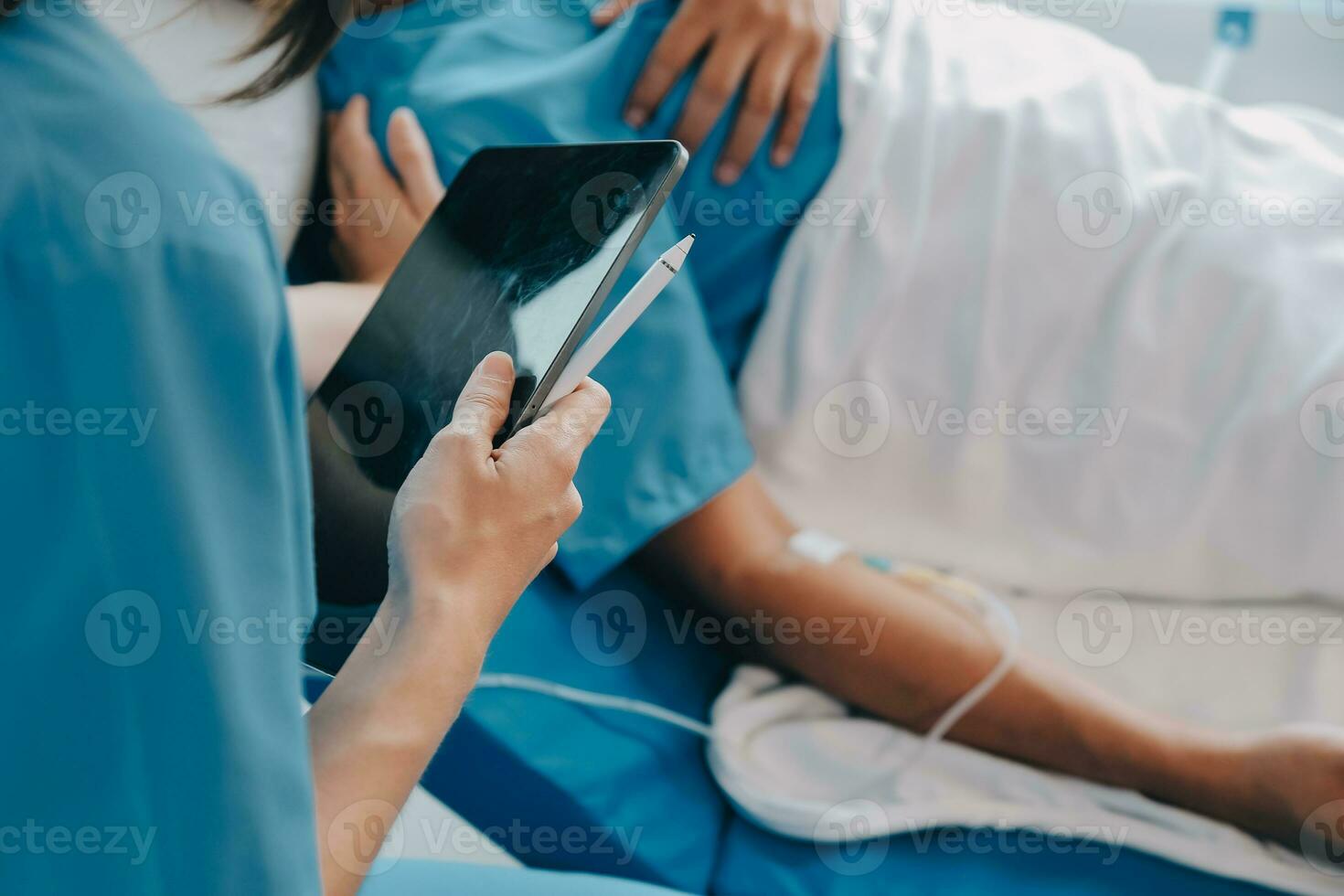 Injured patient showing doctor broken wrist and arm with bandage in hospital office or emergency room. Sprain, stress fracture or repetitive strain injury in hand. Nurse helping customer. First aid. photo