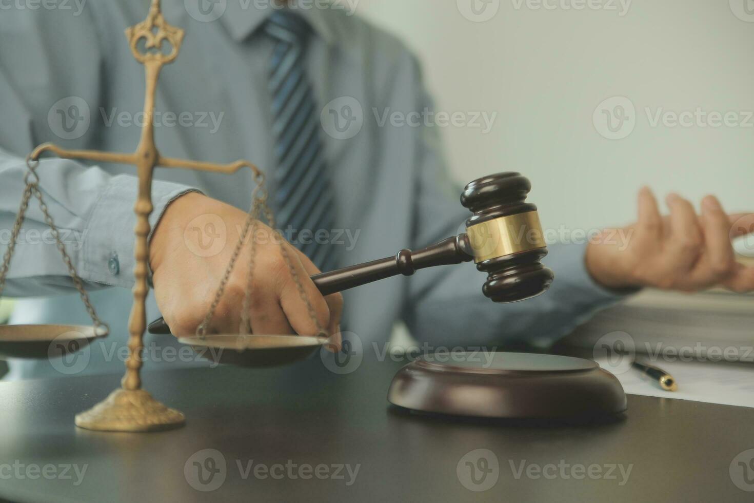 Lawyer, legal advisor, businessman brainstorming information on agreement details Business contracts in legal processing books for accuracy in contract documents. joint financial investment. photo