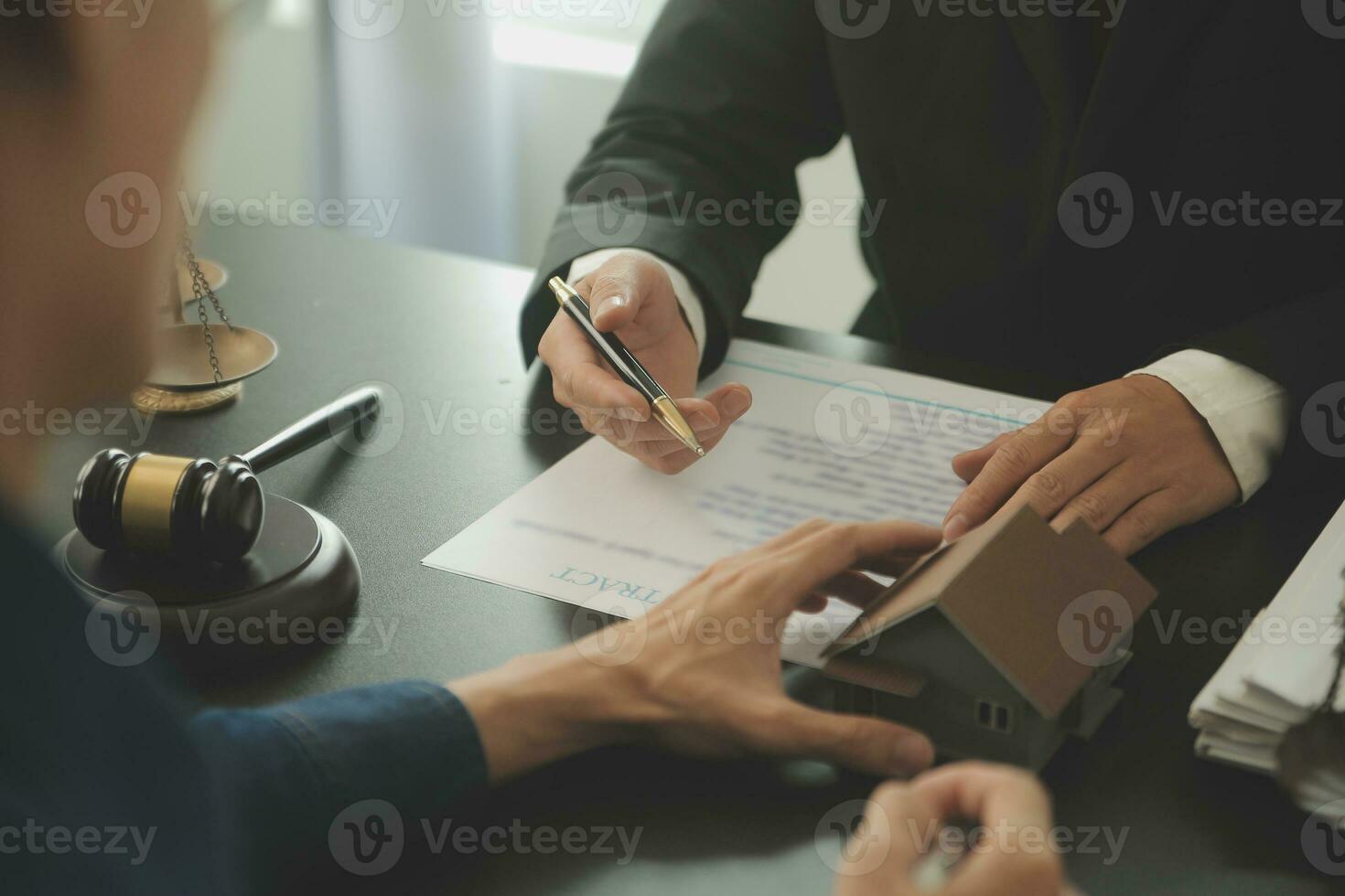 Lawyer, legal advisor, businessman brainstorming information on agreement details Business contracts in legal processing books for accuracy in contract documents. joint financial investment. photo