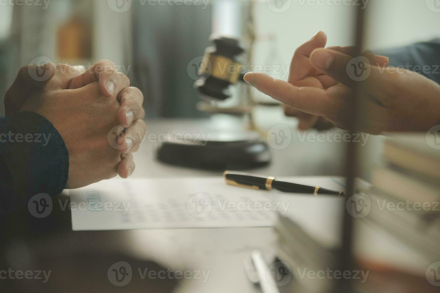 Lawyer, legal advisor, businessman brainstorming information on agreement details Business contracts in legal processing books for accuracy in contract documents. joint financial investment. photo