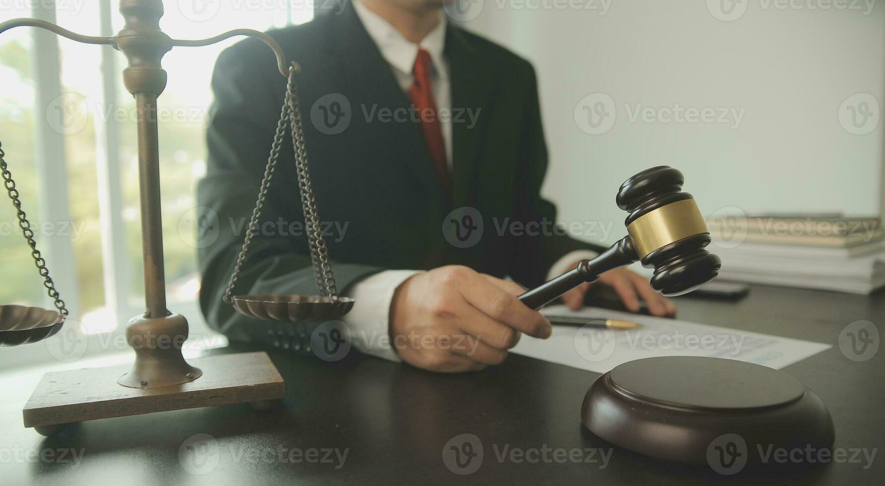 Lawyer, legal advisor, businessman brainstorming information on agreement details Business contracts in legal processing books for accuracy in contract documents. joint financial investment. photo