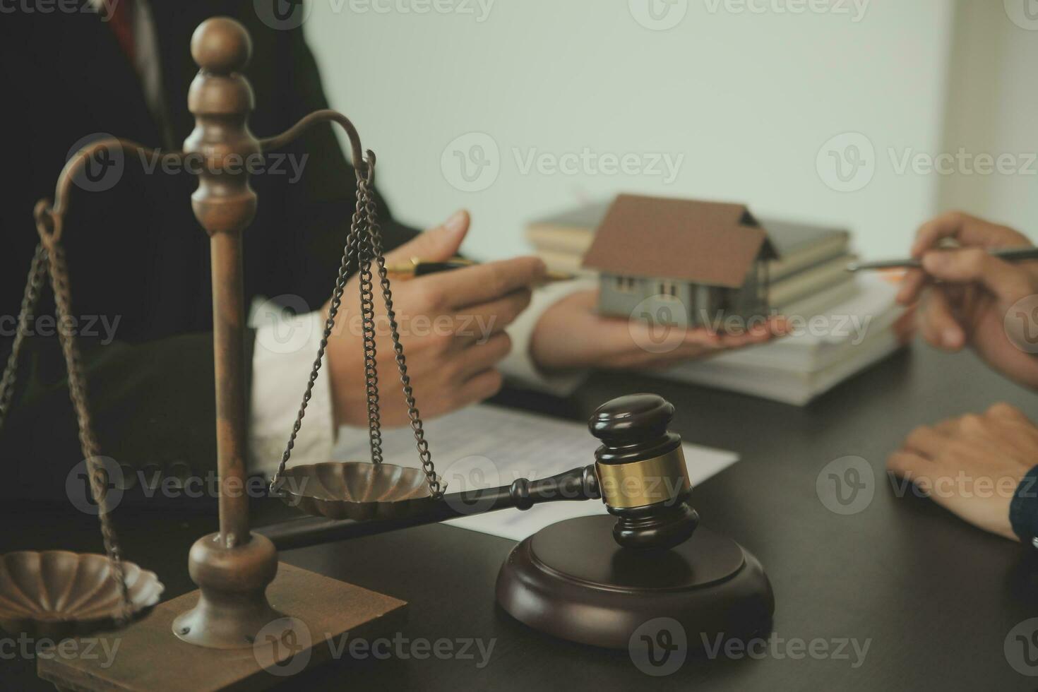 Lawyer, legal advisor, businessman brainstorming information on agreement details Business contracts in legal processing books for accuracy in contract documents. joint financial investment. photo