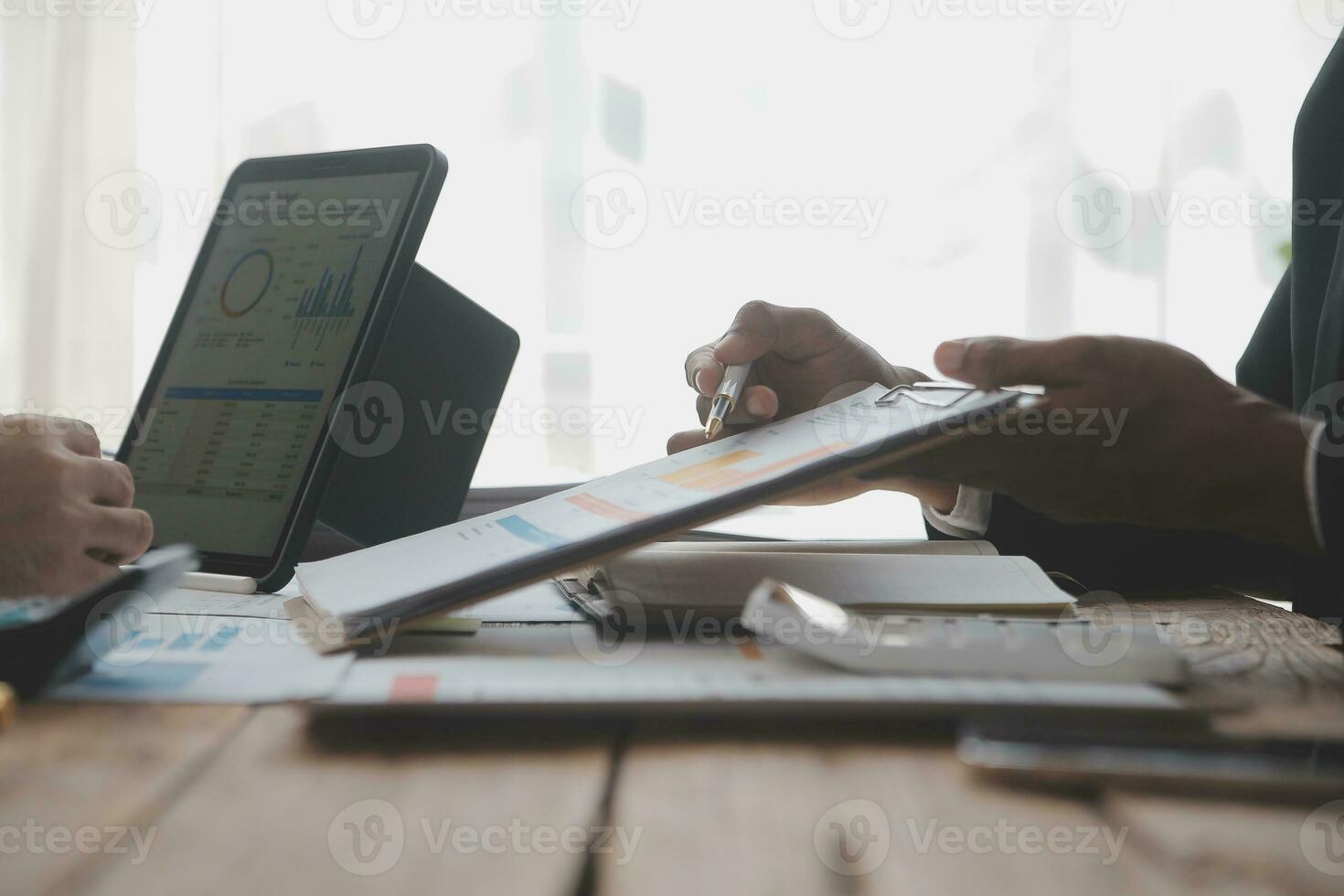 Team of business people working together in the meeting room office, teamwork background charts and graphs banner, double exposure successful teamwork,business planning concept. photo