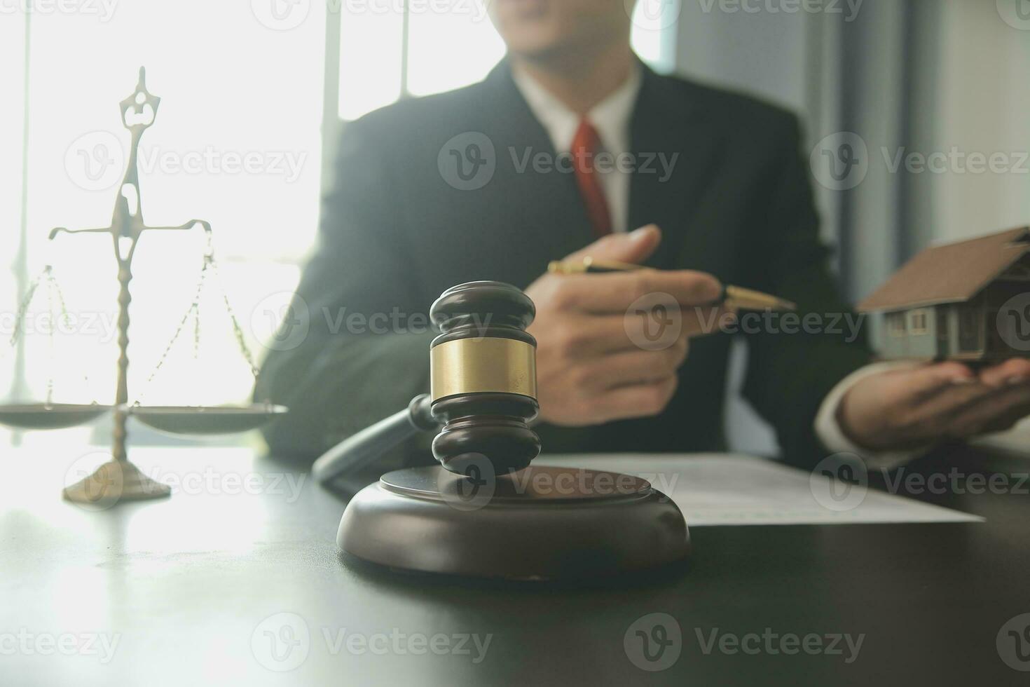Lawyer, legal advisor, businessman brainstorming information on agreement details Business contracts in legal processing books for accuracy in contract documents. joint financial investment. photo