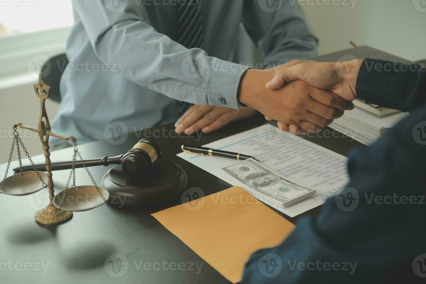 Lawyer, legal advisor, businessman brainstorming information on agreement details Business contracts in legal processing books for accuracy in contract documents. joint financial investment. photo