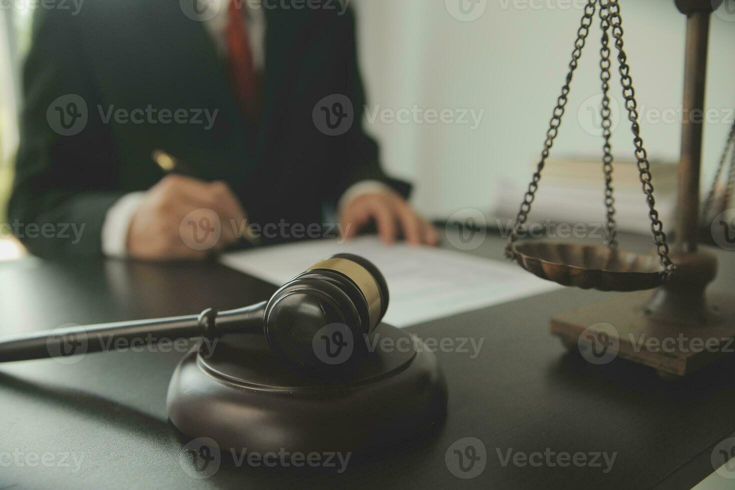 Lawyer, legal advisor, businessman brainstorming information on agreement details Business contracts in legal processing books for accuracy in contract documents. joint financial investment. photo