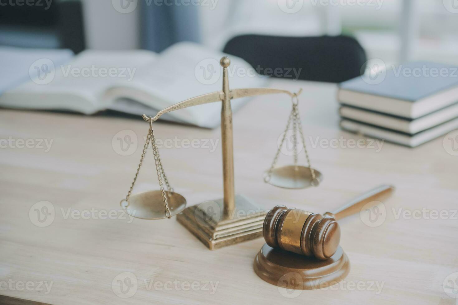 Business and lawyers discussing contract papers with brass scale on desk in office. Law, legal services, advice, justice and law concept picture with film grain effect photo