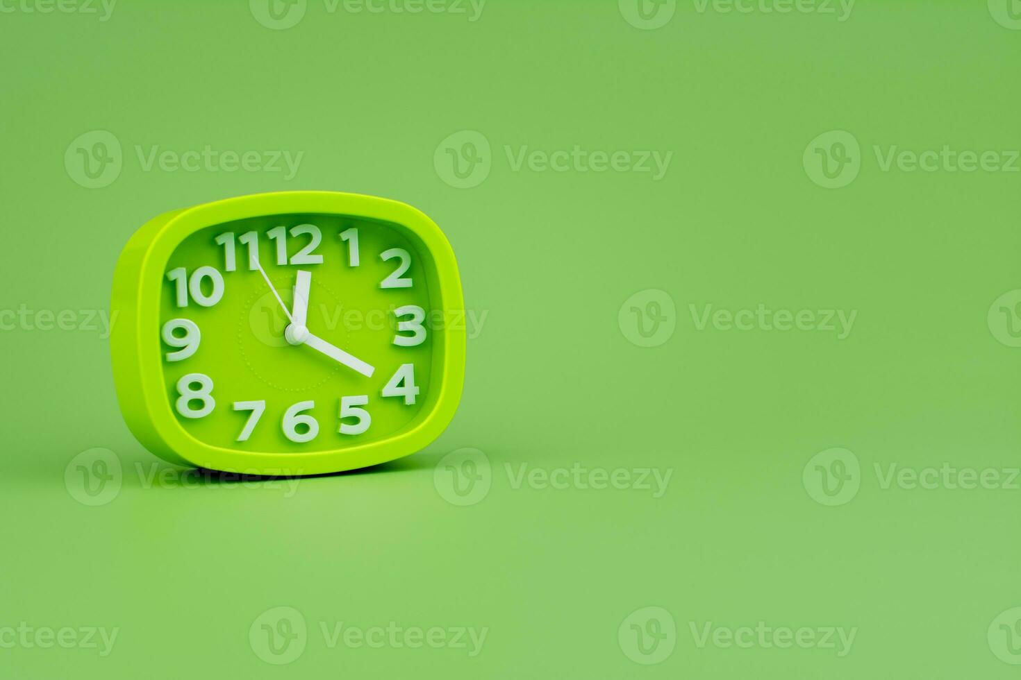 Modern alarm clock with clock hands standing still Working with time, being punctual, time is valuable to work and life. photo